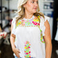 embroidered white women's top