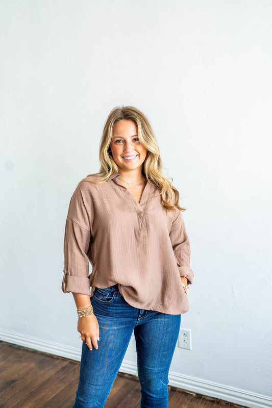 loose fit long sleeve shirt with v neck collar and drop sleeve
