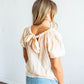 women's basic cream tee with tie-back detail