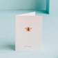 greeting card with a bug illustration that says "just because"